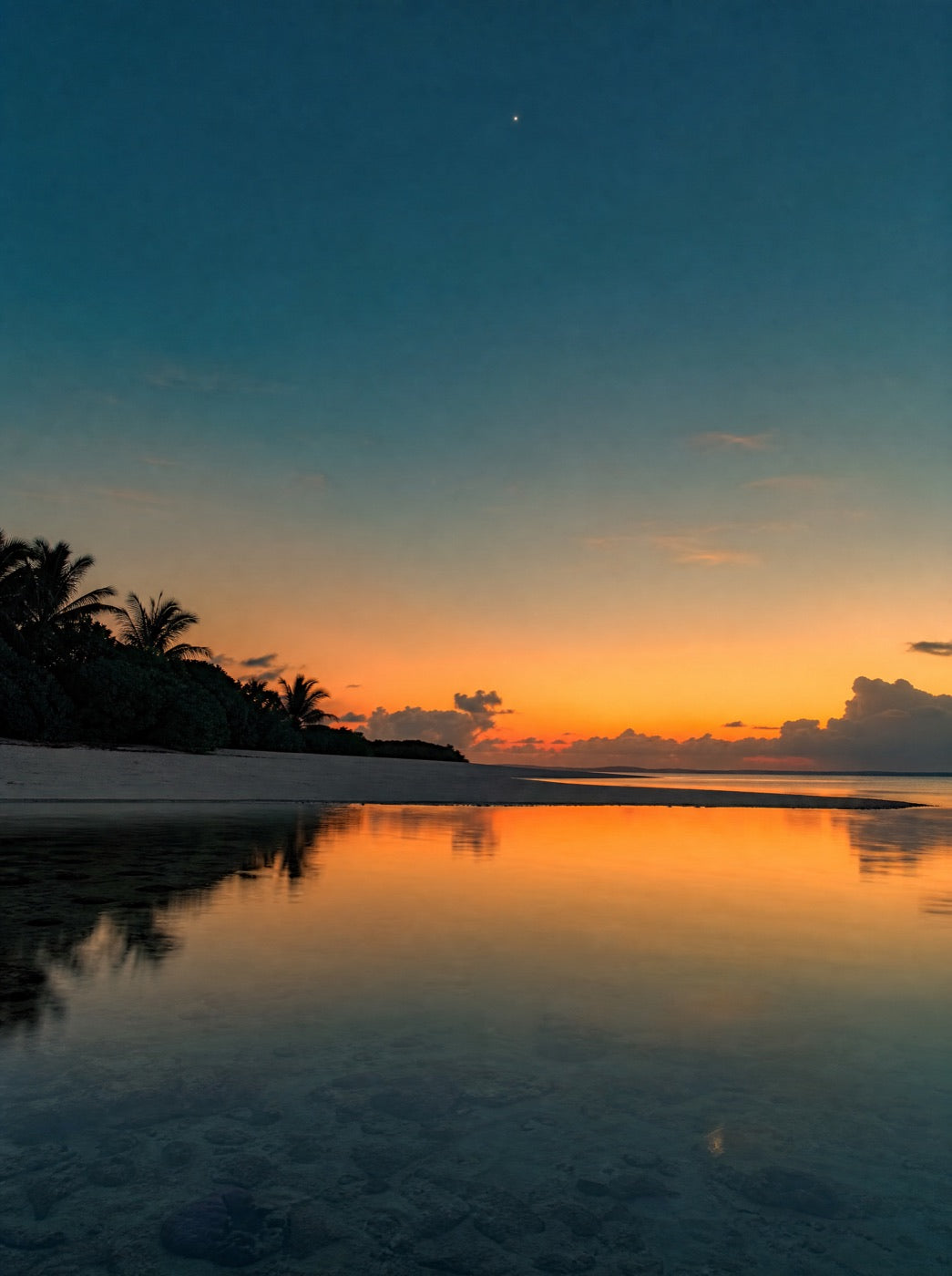 The lagoon at dusk, warm afterglow on calm water